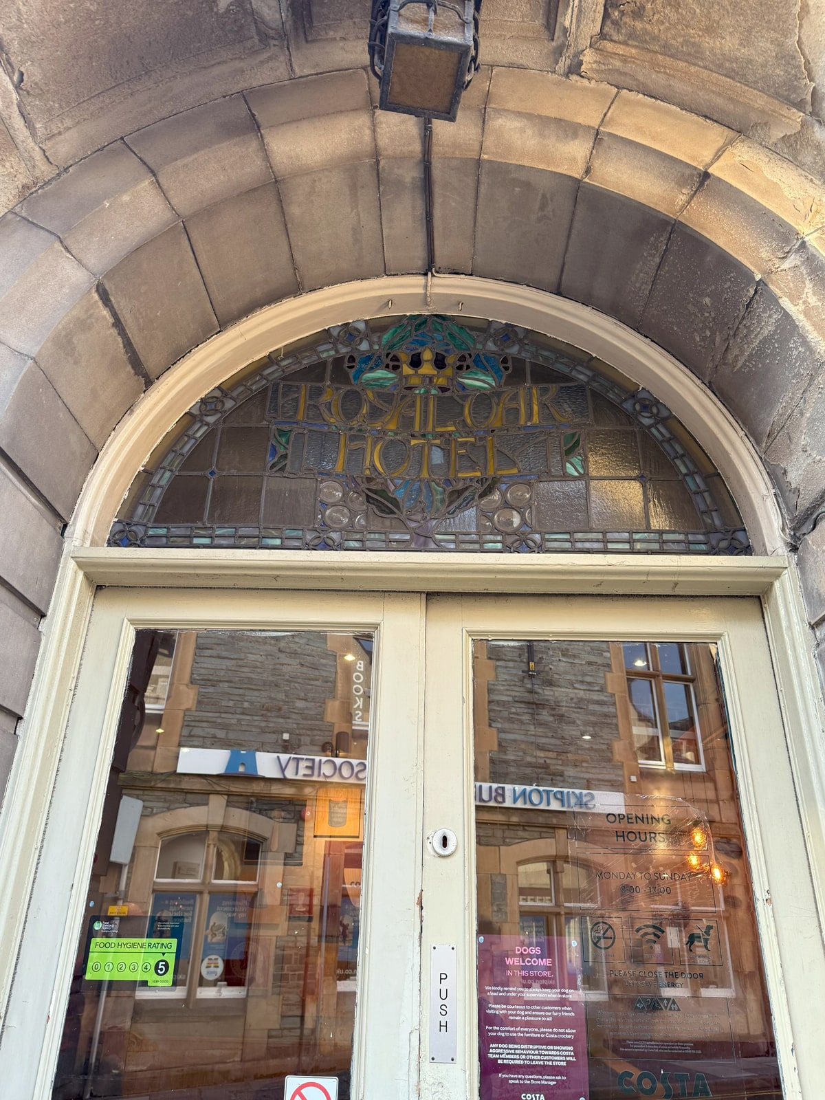 Damaged Costa coffee stained glass